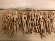 Artists poseable wooden lay figures in two sizes, approximately 50cm and 40cm high, 18 in total