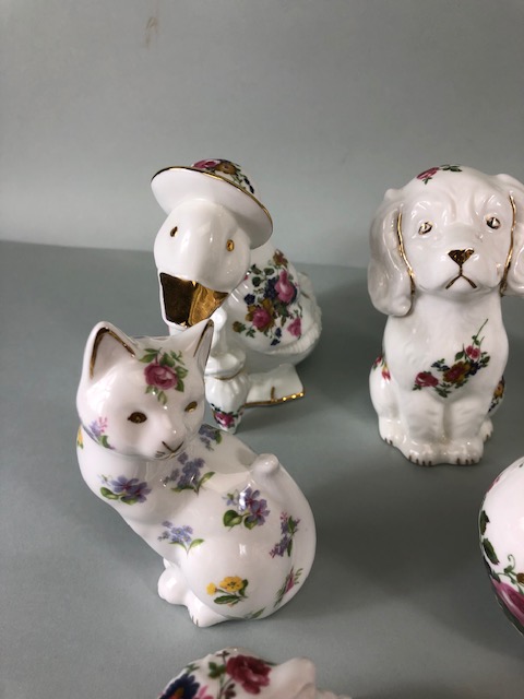 Collectable china figures of various animals each one decorated with flowers 14 in total - Image 8 of 15