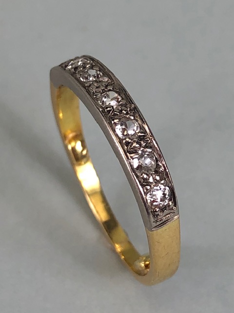 Antique Jewellery, yellow and white metal quarter eternity ring set with 7 diamonds approximately