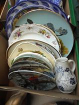 Selection of decorative wall hanging plates and plaques together with German pouring jug