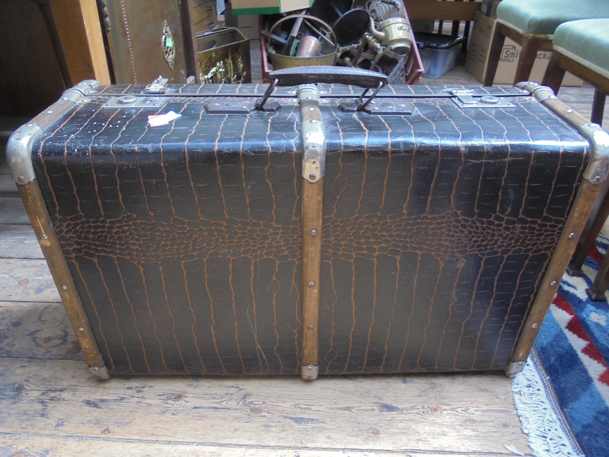 Large mock crocodile skin suitcase of vintage era