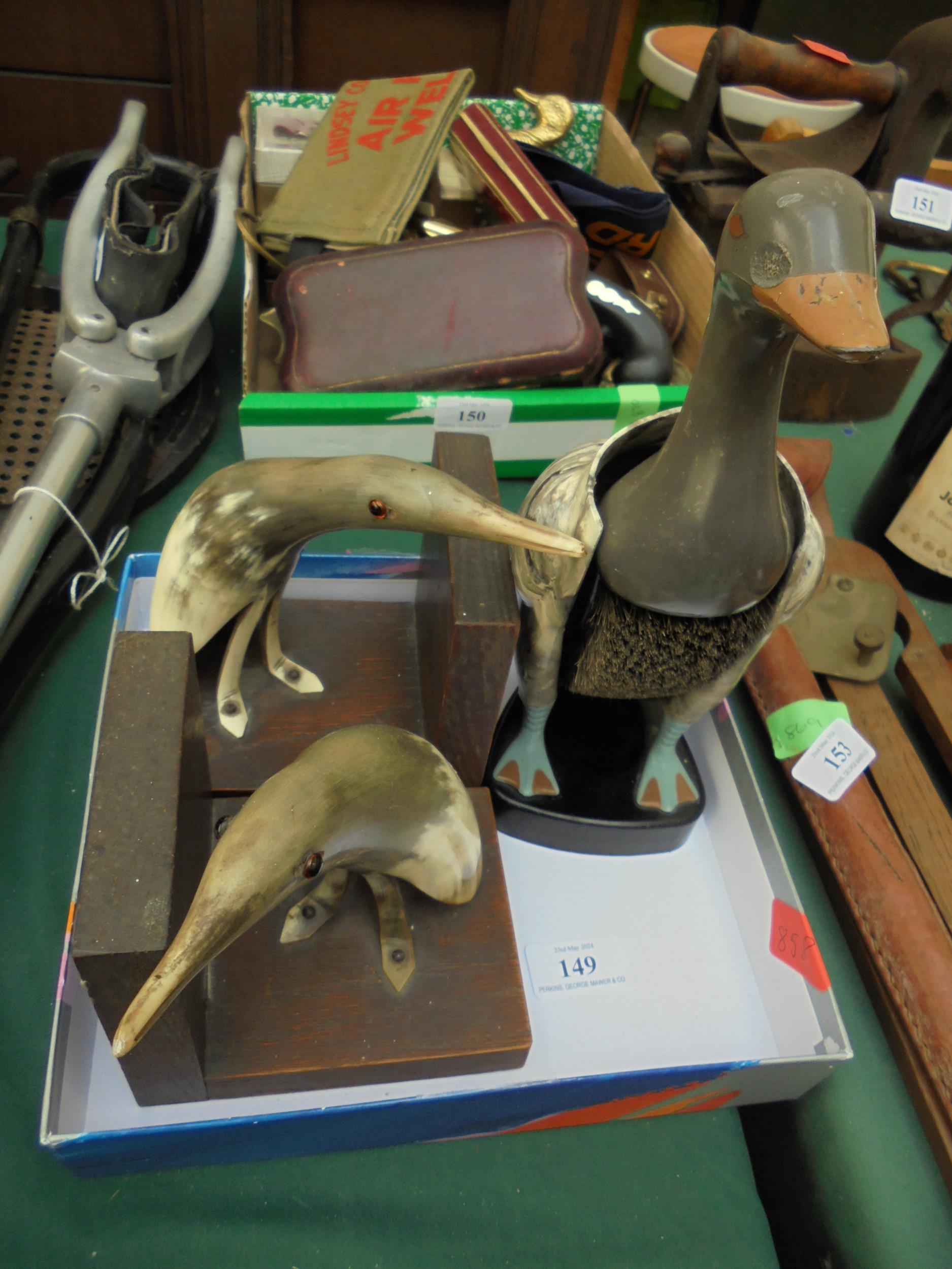 Horn style book ends and clothes brush in shape of duck