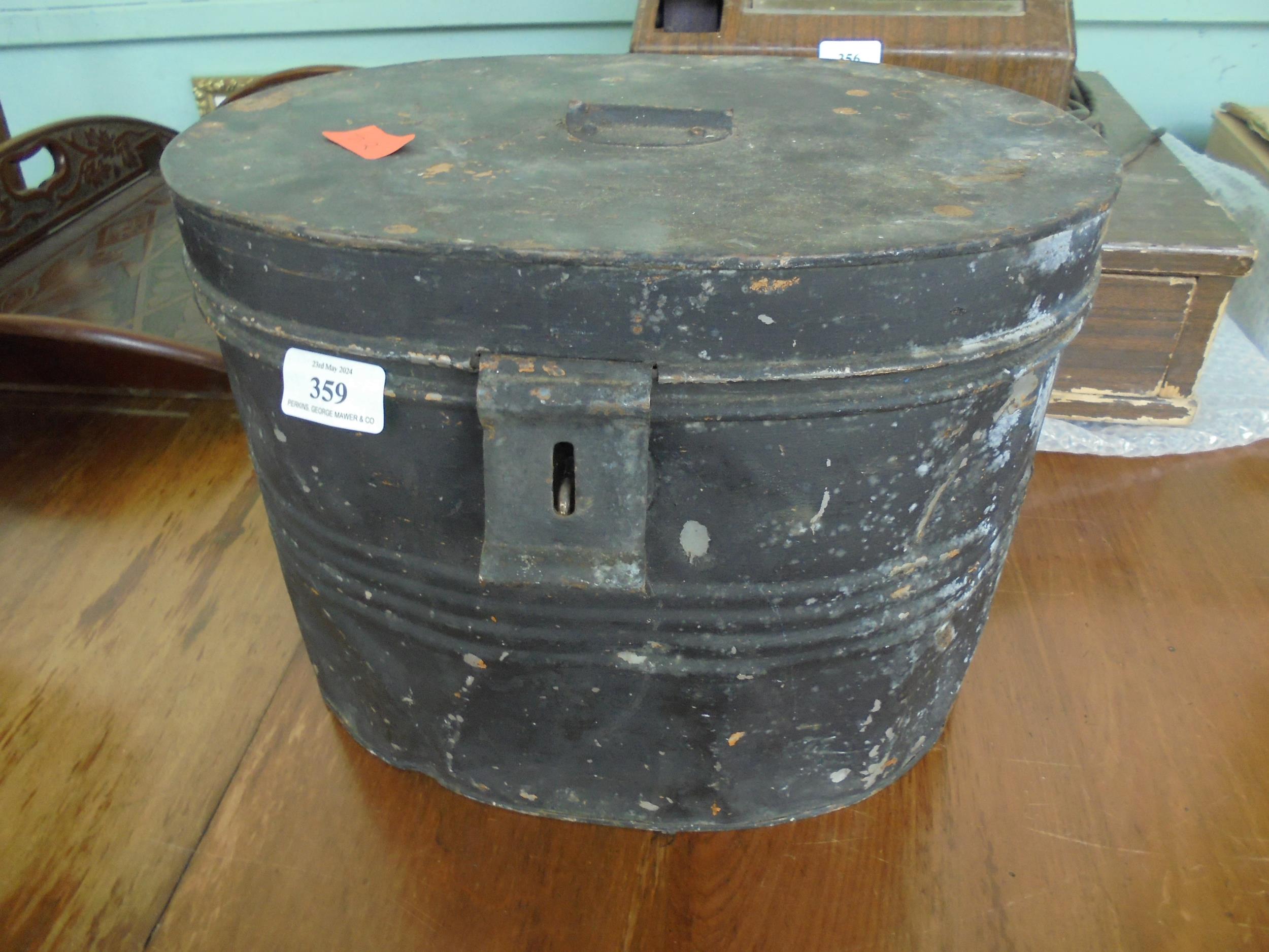 Metal hat box containing 2 bowler hats