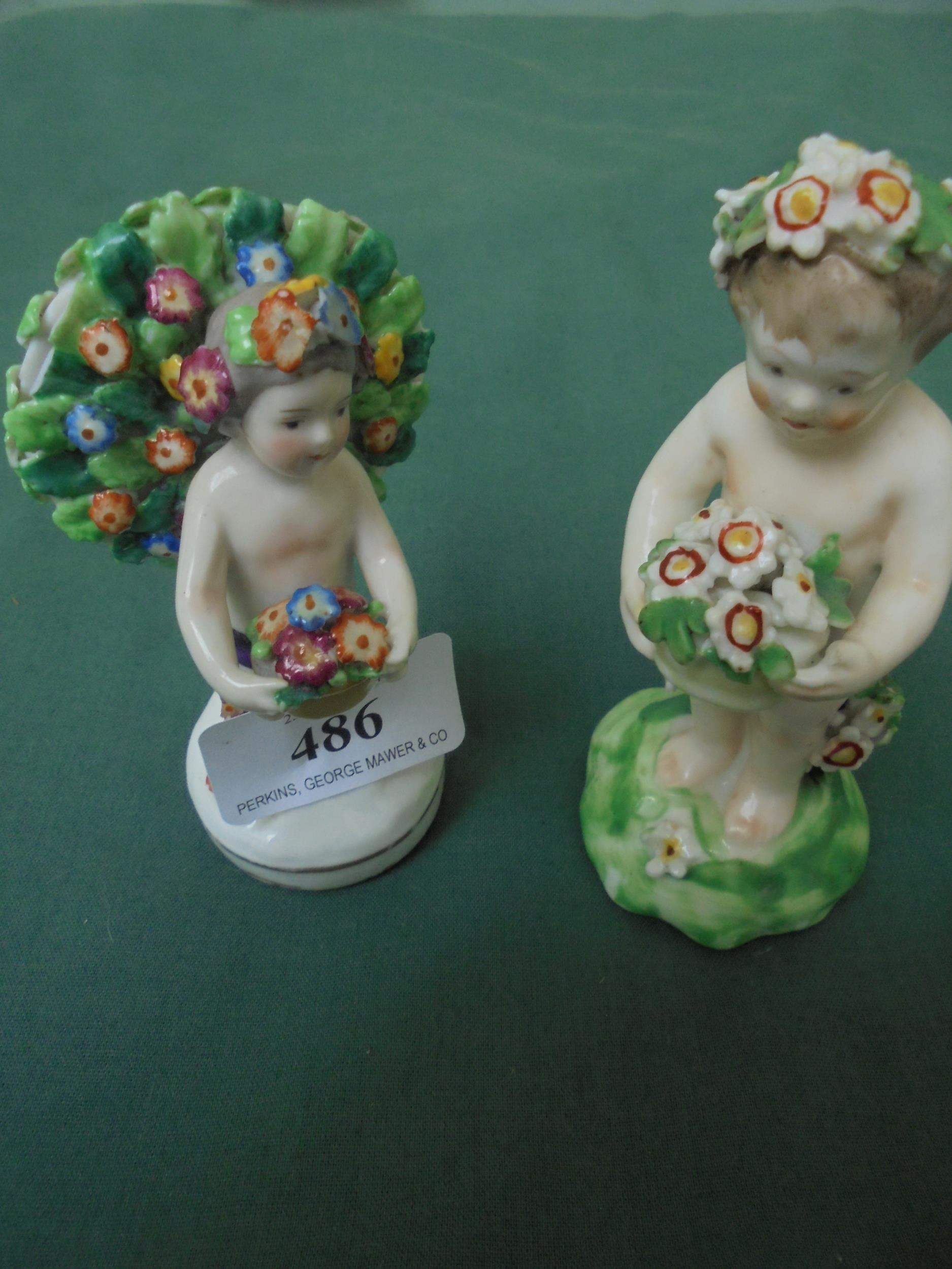 Pair of early Derby cherub figures