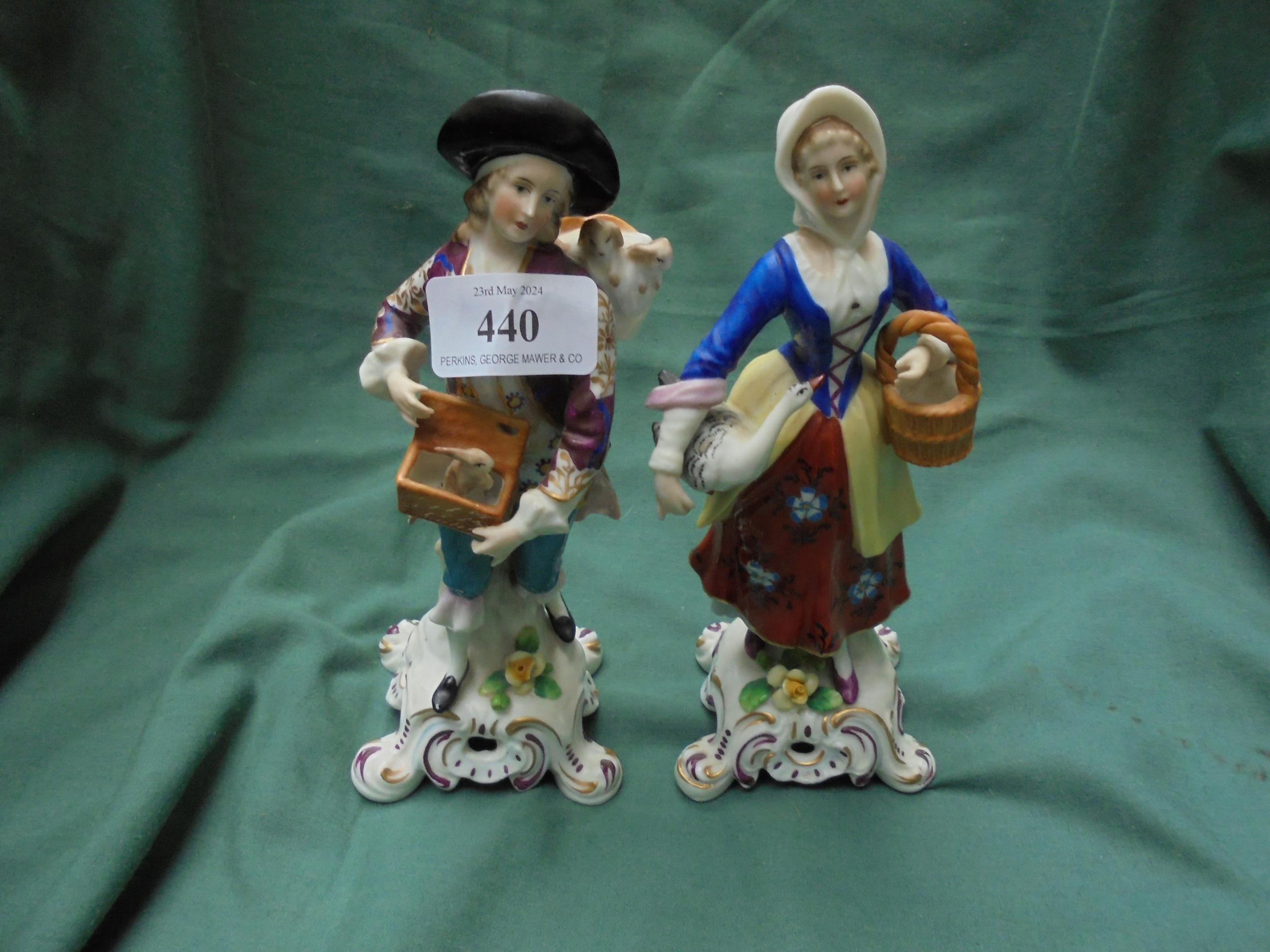 Attractive pair of classical figurines, gentleman with animals and lady with goose,