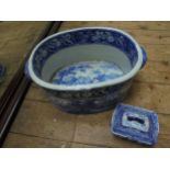 Large blue and white footbath together with blue and white soap holder with drainer