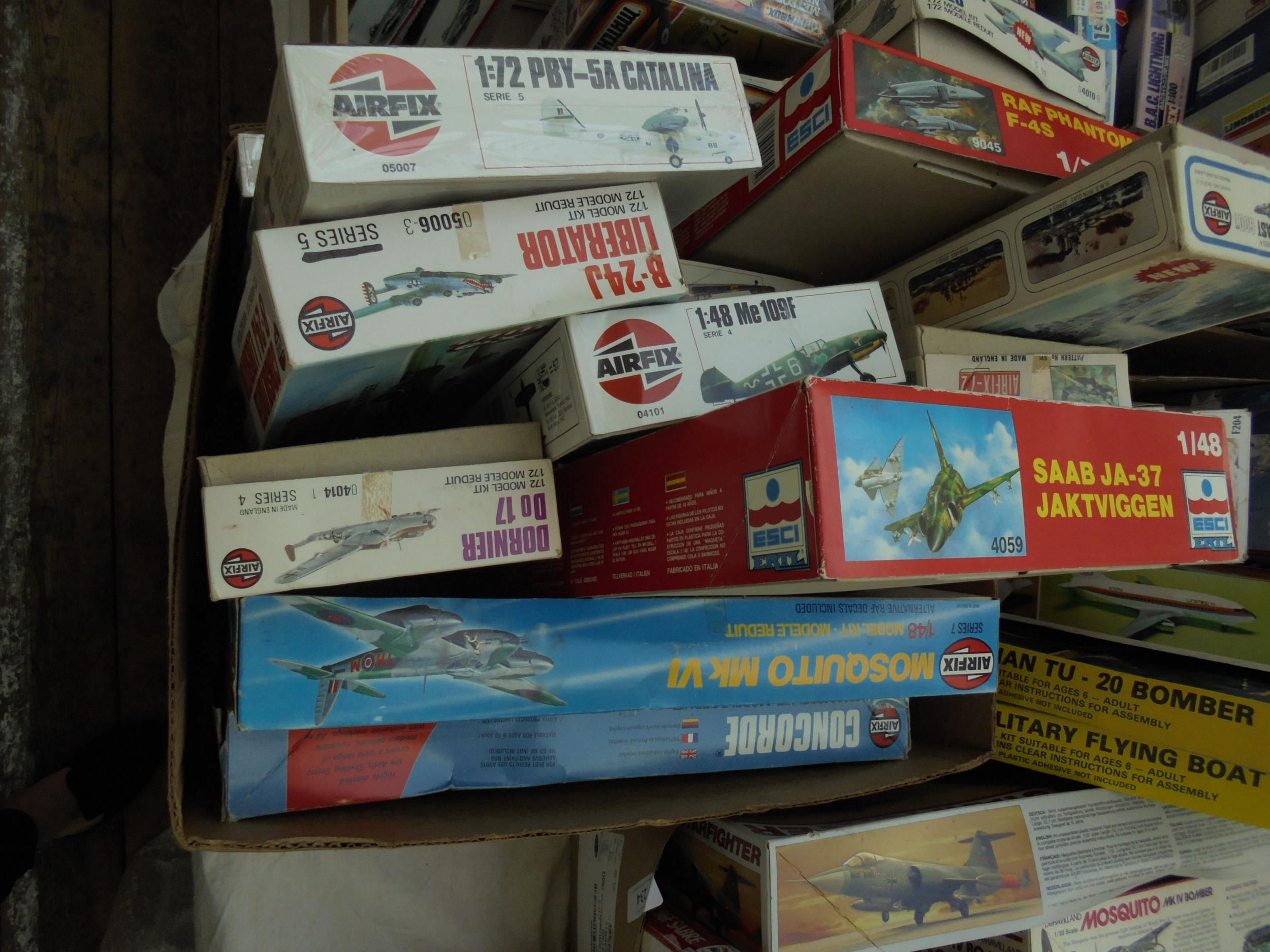 12 models for construction by Airfix and Ertl in original boxes