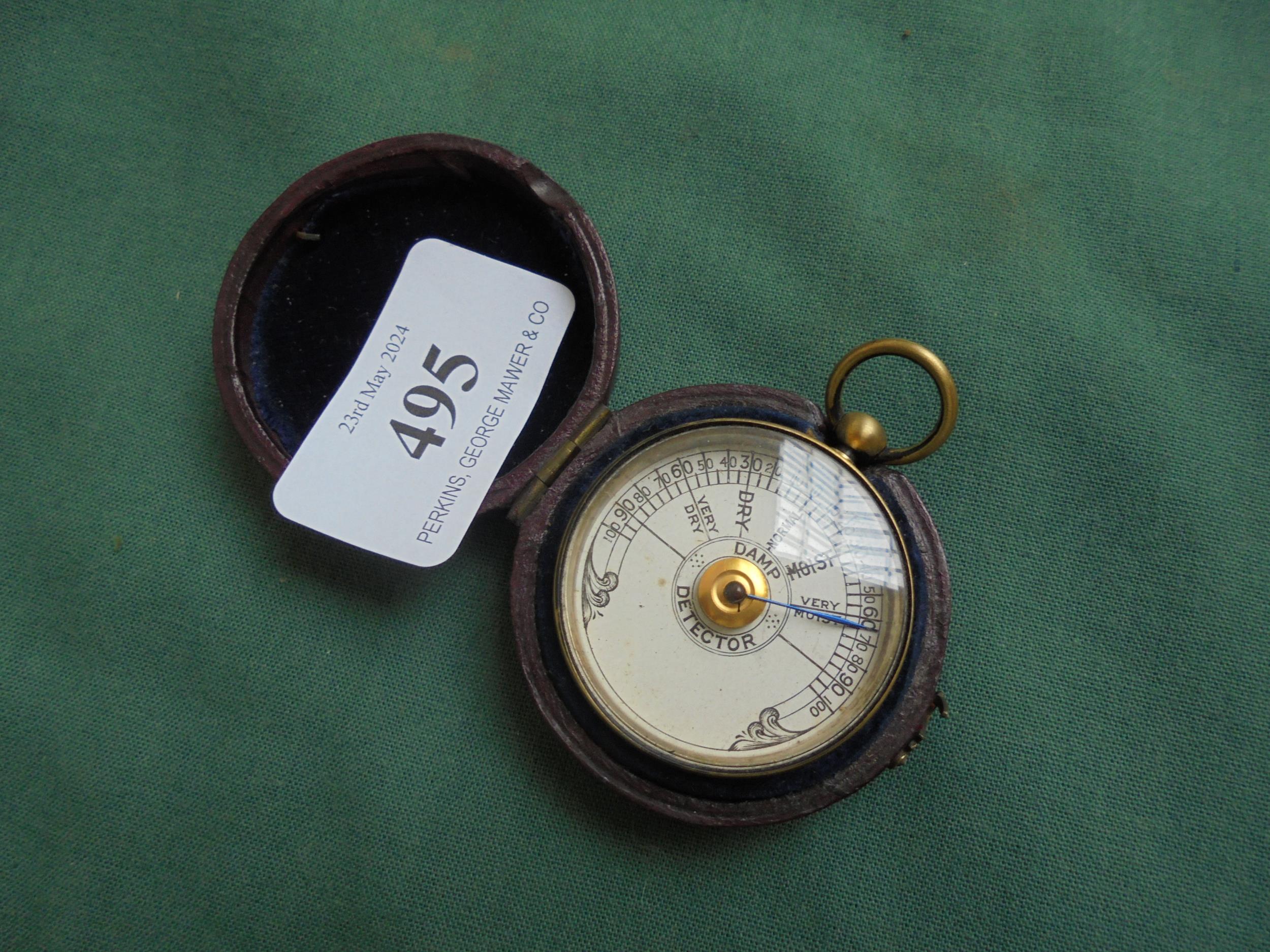 Tiny brass damp meter in original leather case