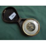 Small barometer in folding leather case,