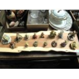 Highly collectable set of 15 Enchantica figures on a wooden board