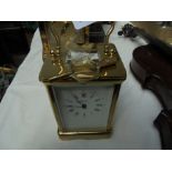 Modern brass carriage clock by Angelus (with key)