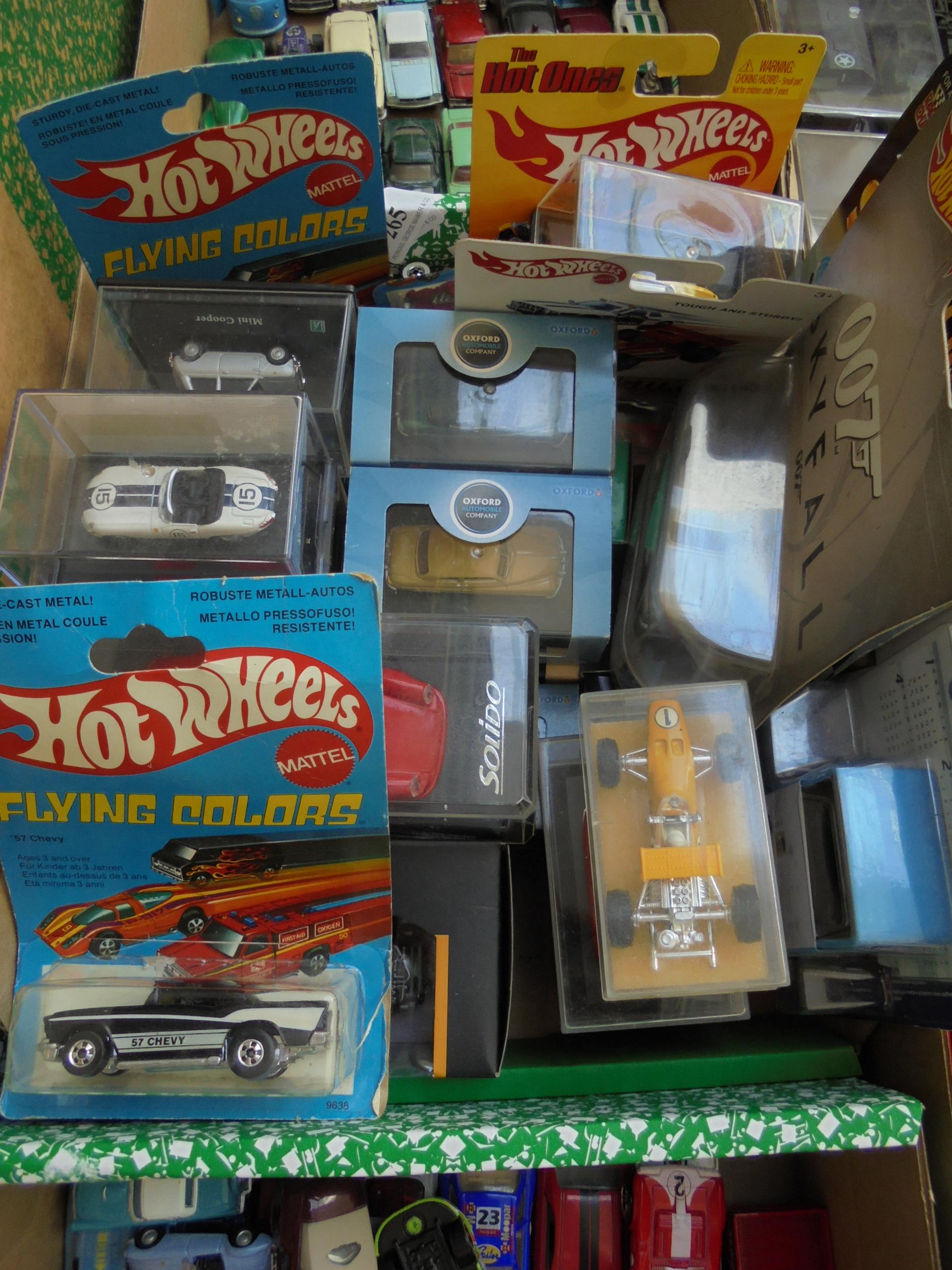 Selection of boxed diecast cars,