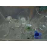 Variety of cut glass items including vases,