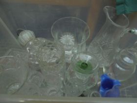 Variety of cut glass items including vases,