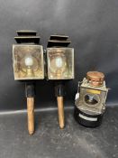 A Felixstowe boat lantern and two carriage lamps.