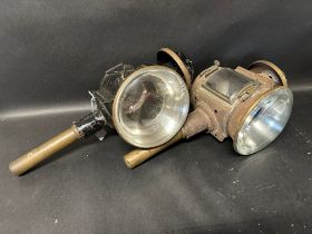 A pair of good quality carriage lamps with convex lenses, marked Gadsons of London.