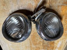 A pair of Lucas auxiliary lamps.