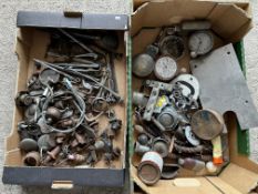 Two boxes of assorted vintage car spares to include AA and RAC car and motorcycle badges, caps etc.