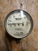 A Ford Model T speedometer.