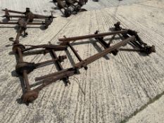 A selection of Austin 7 chassis componets inc. axles.
