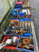 Four pallets of Ford Model T parts inc. front axles, dry shafts, engine parts etc.