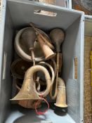 Five early car horns and assorted acetylene lamps.
