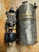 A Powell & Hanmer acetylene generator, an early Simmonds vapouriser (carburettor).
