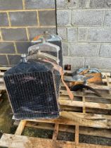 Five Ford Model T radiators with parts, various conditions.