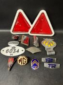A quantity of car badges, warning triangles, an AA badge etc. inc. MG, Rolls-Royce, Humber, Citroen,