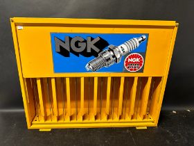 An NGK Spark Plugs wall mounted dispensing cabinet.