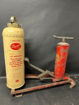 An Everready High Pressure foot-operated lubricator and a Phomene extinguisher (for display purposes