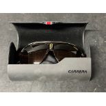 A pair of Carrera Champion sunglasses.