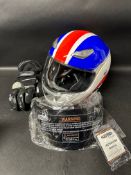 A brand new unused Leopard motor racing helmet, visor and a pair of gloves. Date unknown and