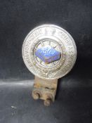 An RAC Associate car badge with Riley Motor Club enamel centre, stud mounted to the reverse.