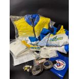 A quantity of motor racing-related promotional items including clothing, goggles, lapel badges,