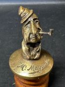 A rare car accessory mascot depicting "Mr Maymore" by May & Padmore Ltd. of Birmingham, issued