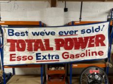 An Esso Extra Gasoline Total Power canvas advertising banner, 91 x 32 1/2".