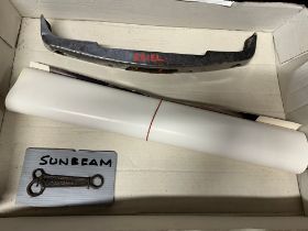 An Ariel Leader bike part, Sunbeam spanner and a Triumph Trident dealer poster.