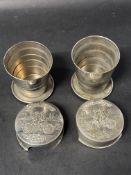 Two Cyclists collapsible cups and three duster overcoats.