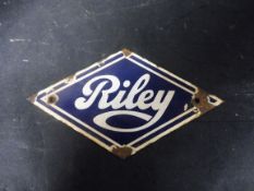 A Riley lozenge shaped enamel door plaque, 5 3/4 x 3 1/4