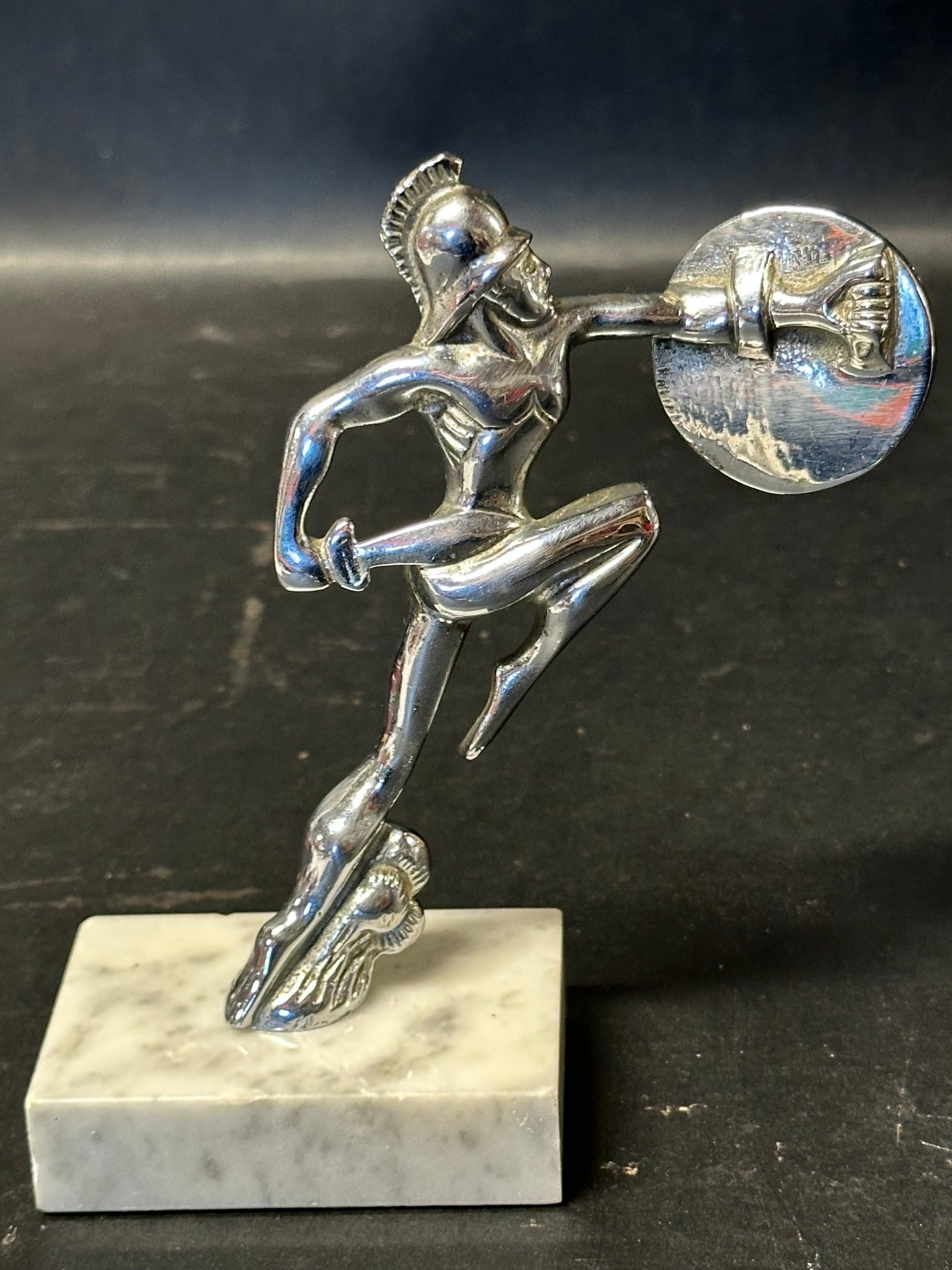 A car accessory mascot depicting a warrior holding a shield, by repute for British Salmson Motor