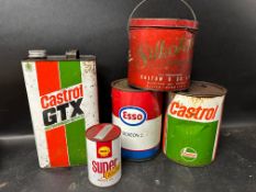 Five motor oil and grease cans inc. Esso, Castrol GTX, Silkolene, Shell etc.