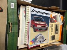 A box full of car brochures including Rover, Fiat etc.