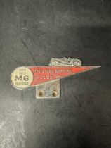 A rare Toulmin Motor Club "For the MG Enthusiast" car badge numbered H488 on verso