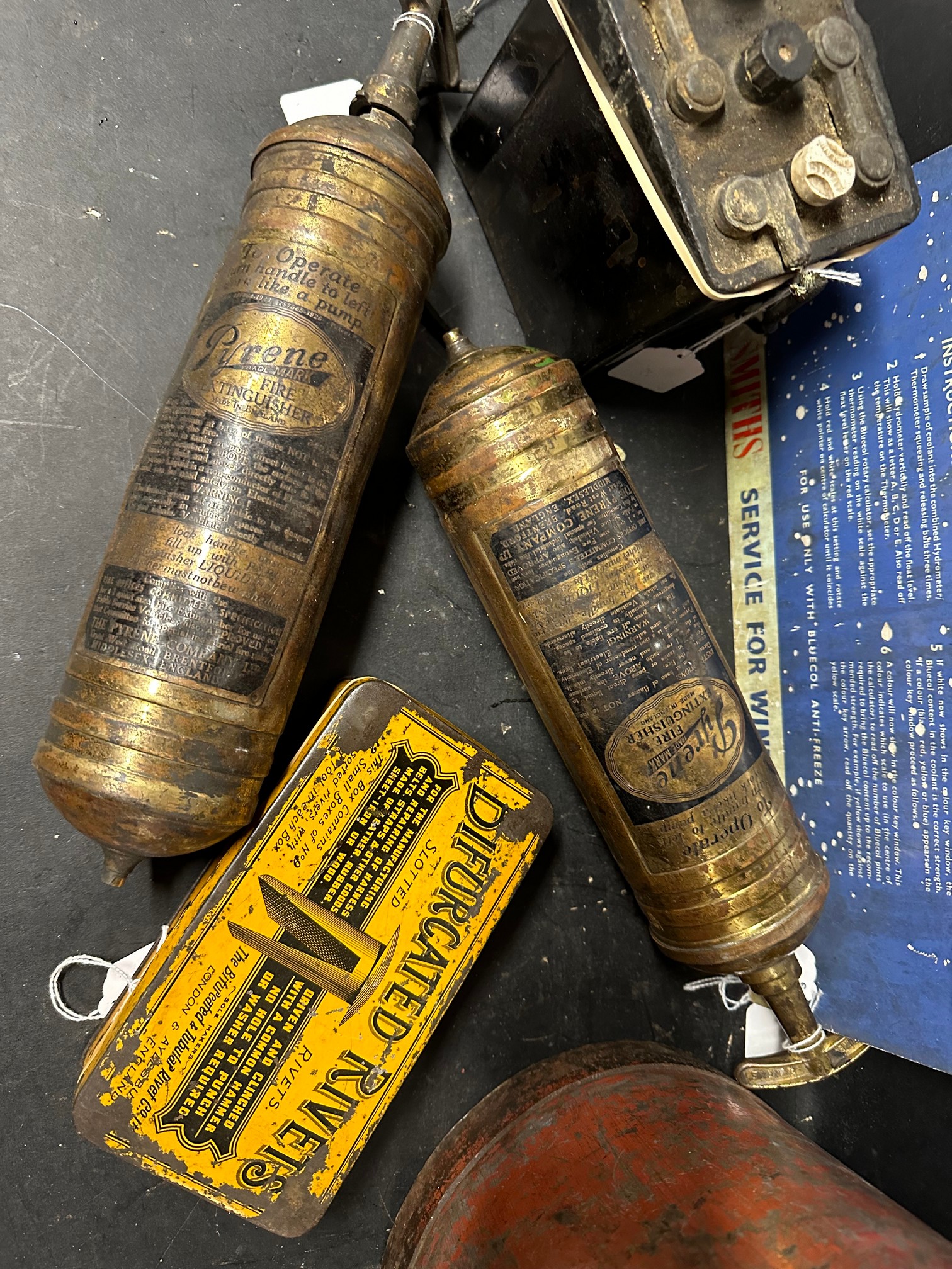 A Bluecol anti-freeze calculator tin chart, a Bifurcated Rivets tin, two pyrene extinguishers, an - Image 2 of 4