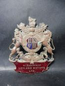 A part enamel car badge 'by Appointment Leyland Motors Ltd.'