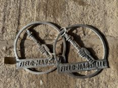A pair of Field Marshall Tractor cast aluminium emblems.