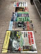 Five motor racing posters.