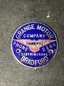 An enamel supplier dashboard plaque, badge, emblem for Ernest Whatfield Ltd. Sheffield.