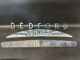 Three lorry/truck radiator name plates: Bedford, Commer, Albion.